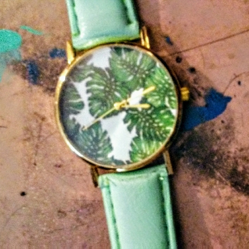 NWT Green leather palm leaf face watch